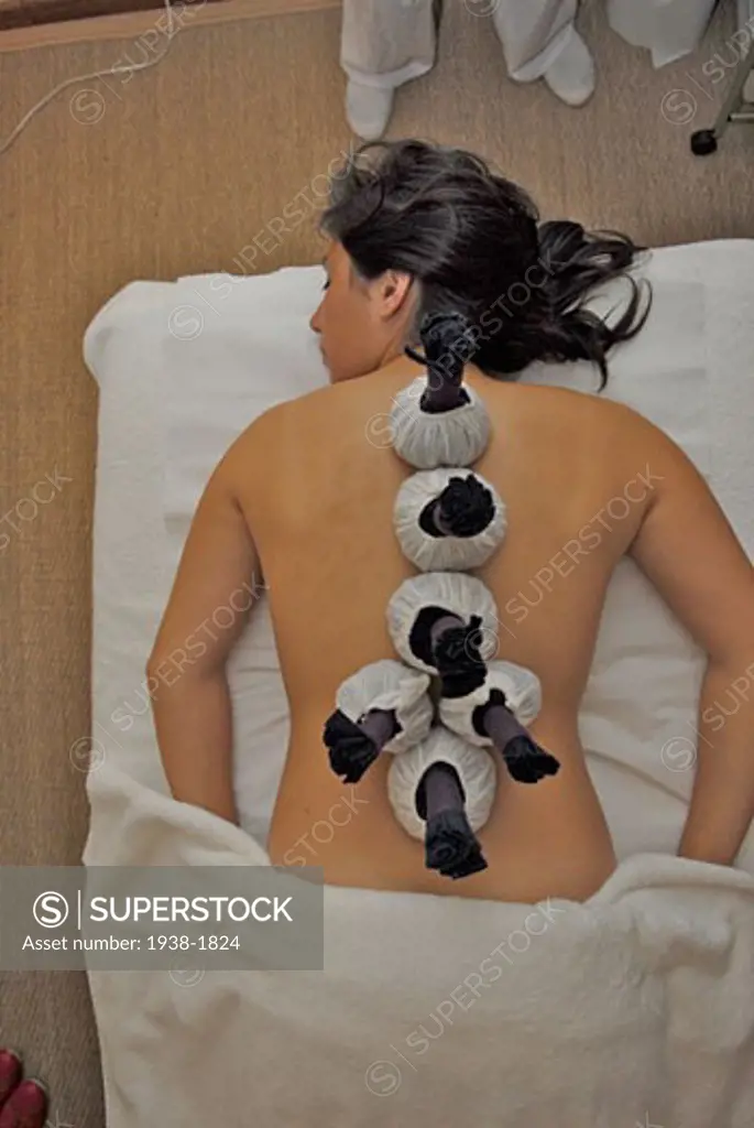 Chinese massage with small bags  at Estar Spa  in Santa Eulalia  Ibiza