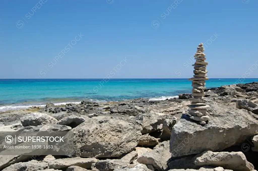 Stone sculpture on Llevant beach  Formentera  Balearic Islands  Spain