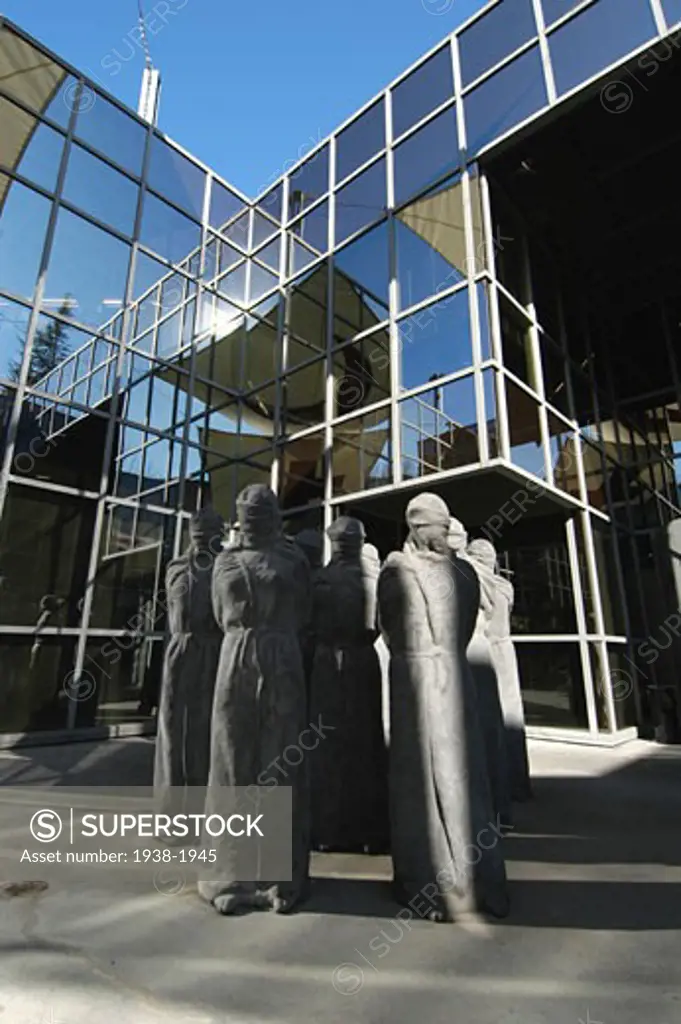 Les Petrifies  The Petrified  sculpture by Carl Bucher that denounces the violation of human rights and appeals for tolerance Croix Rouge Musee  Red Cross Museum entrance sculpture  Geneva  Switzerland