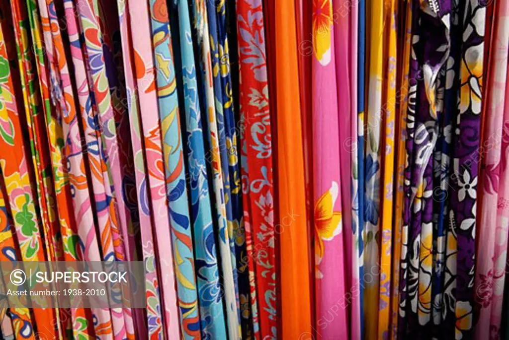 Colorful pareos  a beach wear  in a street clothes shop in the port area of Ibiza