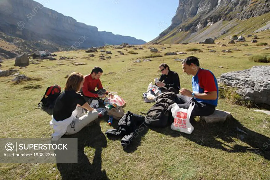 Sunday friends hiking in the Pyrenees Walking to the Valle de Ordesa and Monte Perdido a beautiful valley located in the spanish Pyrenees in the province of Huesca at the north of Spain