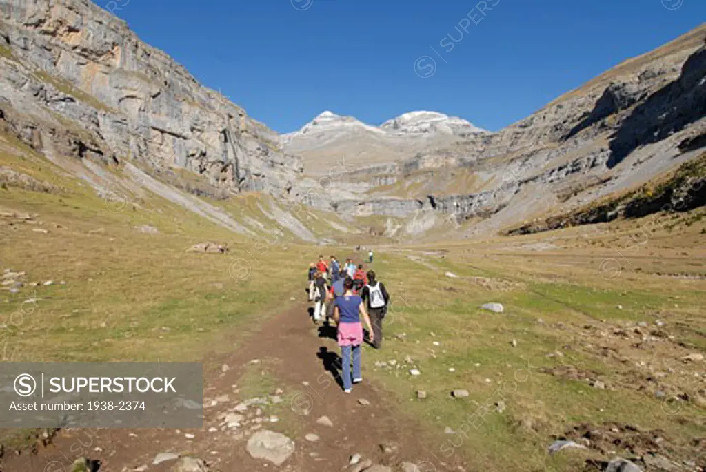Sunday friends hiking in the Pyrenees Walking to the Valle de Ordesa and Monte Perdido a beautiful valley located in the spanish Pyrenees in the province of Huesca at the north of Spain