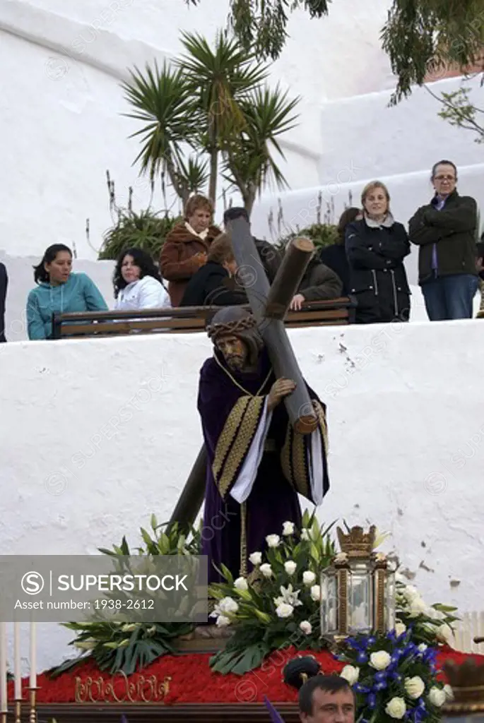 Good Friday Easter Parade in Santa Eulalia del Rio Ibiza They start from Puig de Missa church that gives name to an architectural ensemble situated situated on a hilltop and walk down through this coastal Mediterranean village