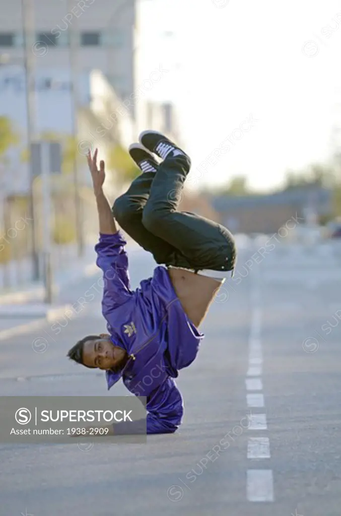 Breakdancer performing on street