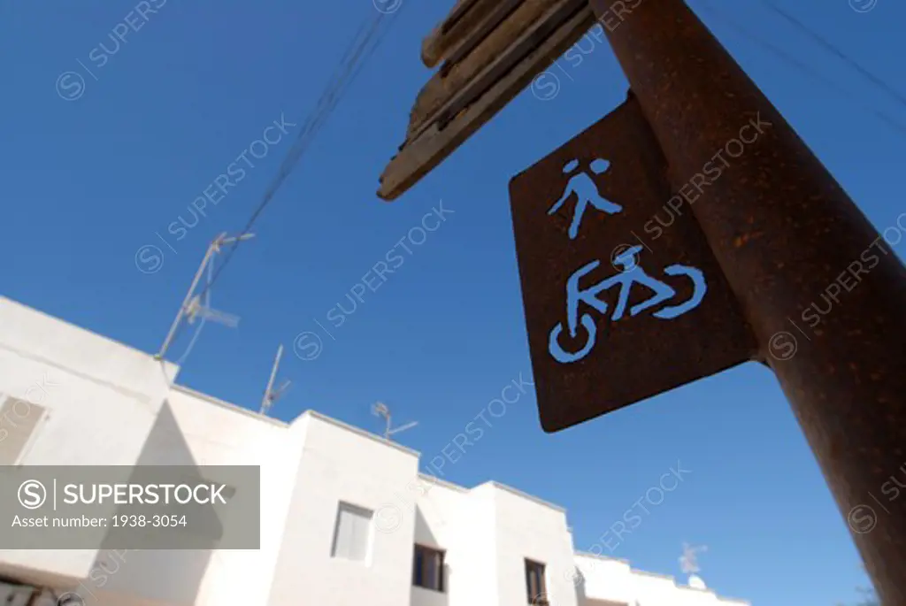 Low angle view of a 'Bicycle and Pedestrian Crossing sign', Sant Francesc Xavier, Formentera Island, Balearic Islands, Spain