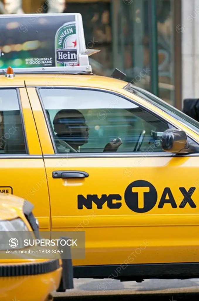 Yellow taxis on the road in a city, Manhattan, New York City, New York State, USA