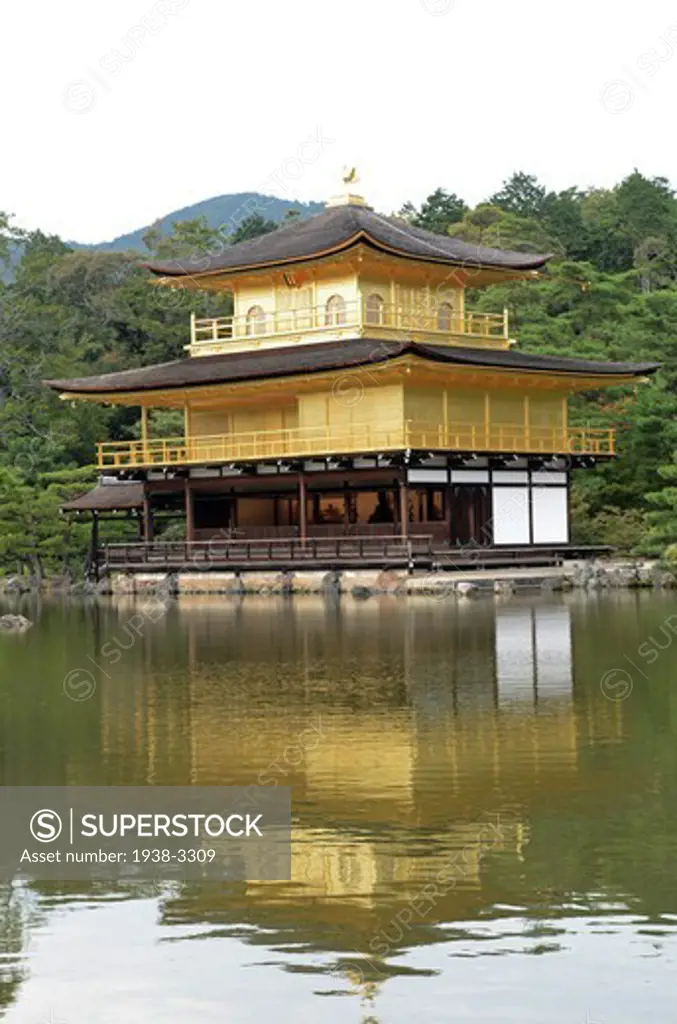 Reflection of Temple of the Golden Pavilion on water, Kinkaku-ji Temple, Kyoto Prefecture, Honshu, Japan