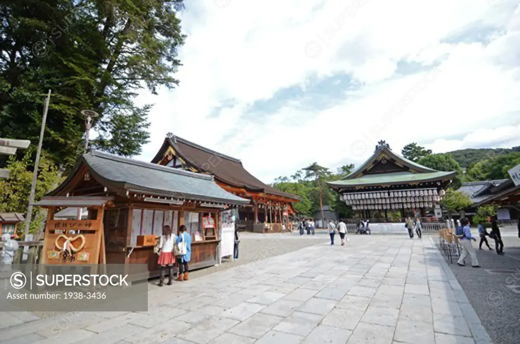 People at a main complex of a shrine, Yasaka Shrine, Maruyama Park, Kyoto Prefecture, Honshu, Japan