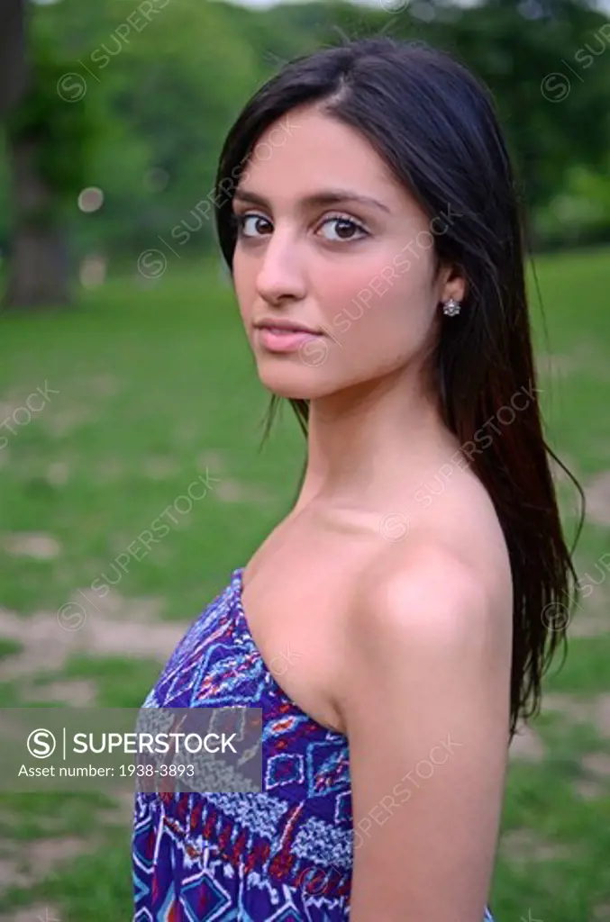 Attractive young mixed race woman in Central Park, New York City