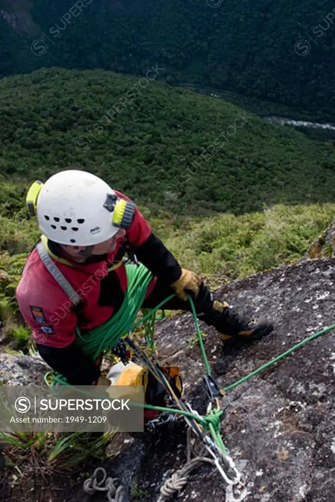 Member of Ukhpacha Project rappeling