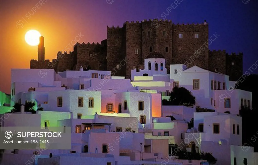 Greece, Dodecanese, Patmos Island, Townscape with castle at night