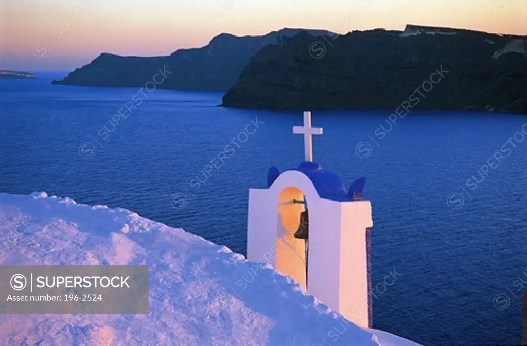 Greece, Cyclades, Santorini Island, Oia village, Whitewashed bell tower and sea