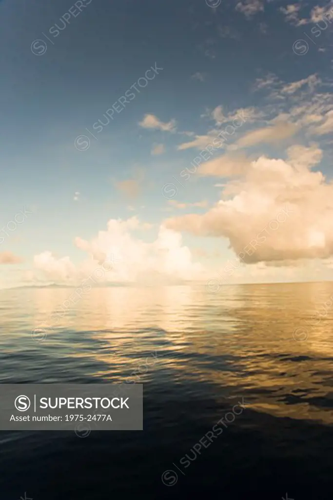 Reflection of clouds in the sea, Huahine Island, Tahiti, French Polynesia