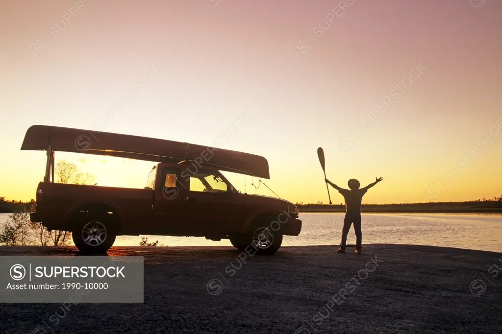 Excited about canoeing, White Lake, Whiteshell Provincial Park, Manitoba, Canada.