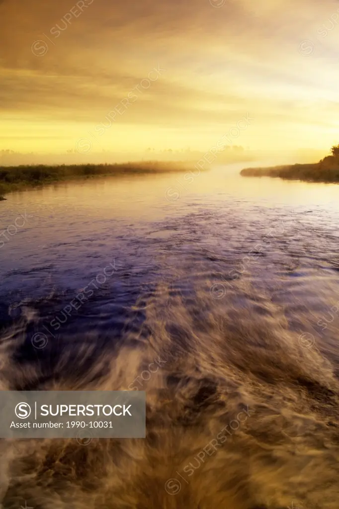 Flowing water along the Whiteshell River at sunrise,Whiteshell Provincial Park, Manitoba, Canada.