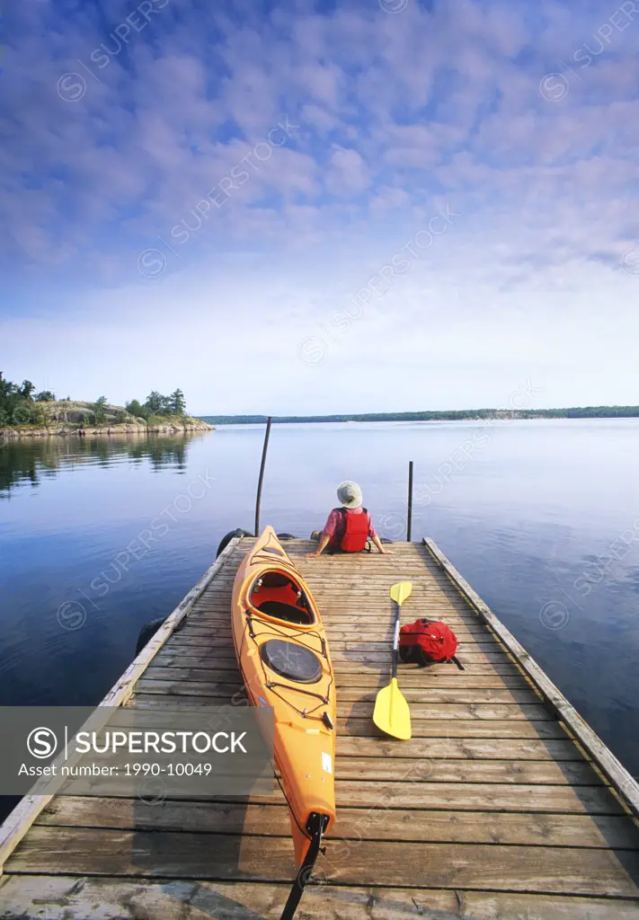 Kayak on boat dock, Nutimik Lake campground,Whiteshell Provincial Park, Manitoba, Canada.