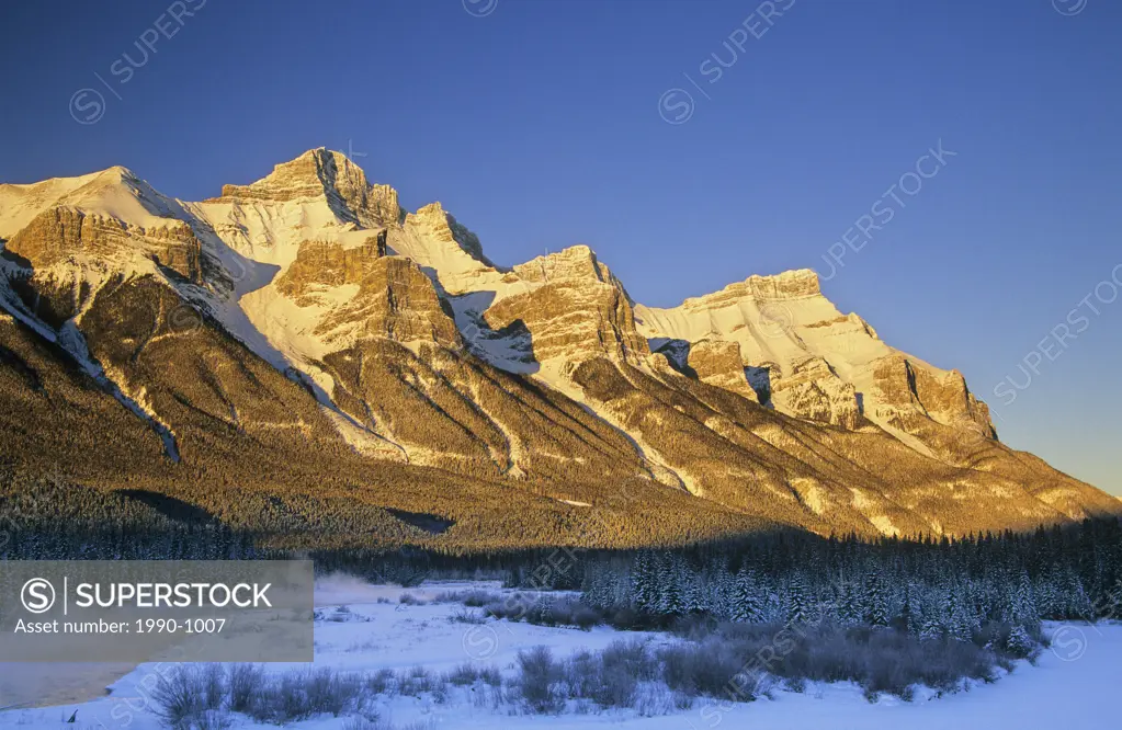 Winter sunrise on Mount Rundle and the Bow River, Alberta, Canada