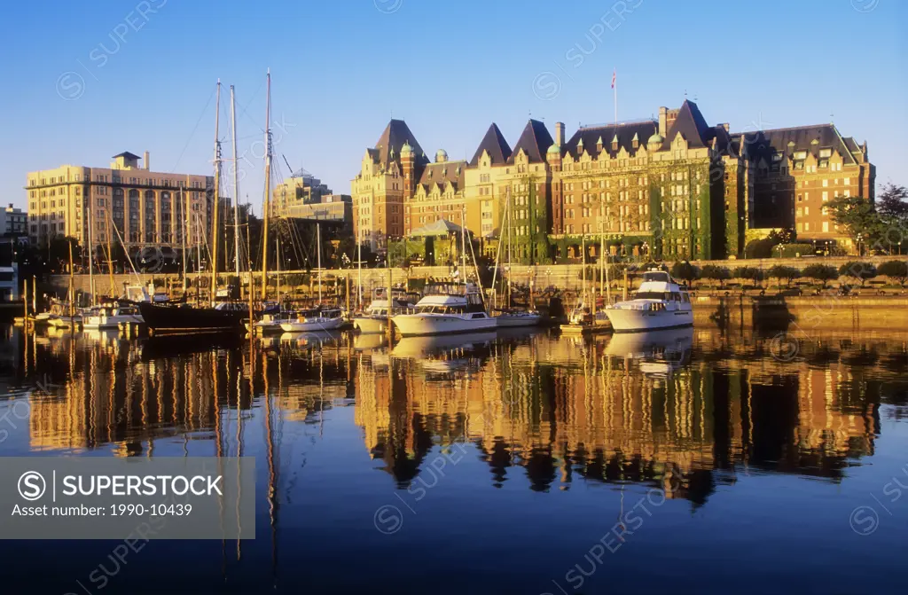 The Empress Hotel reflected in inner harbour, Victoria, British Columbia, Canada.