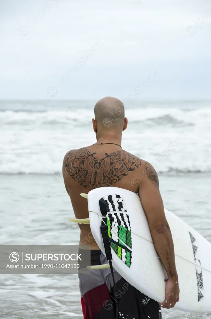 Surfers at Playa Santa Teresa, Puntarenas Province, Costa Rica.