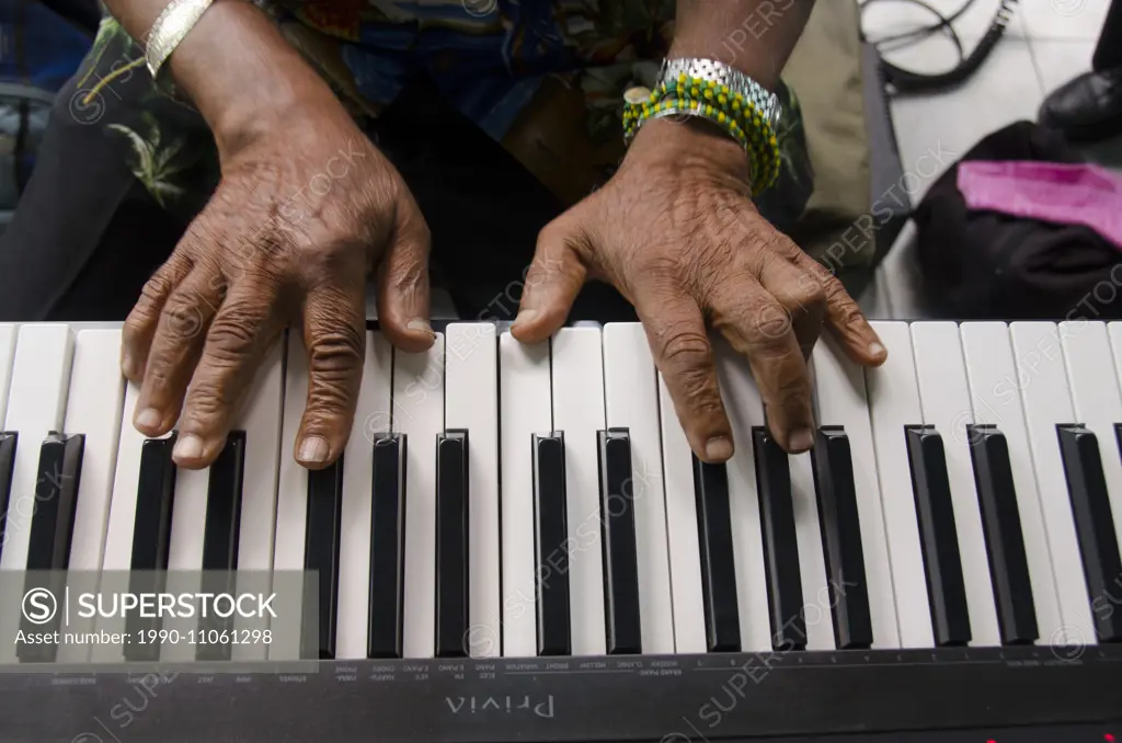Hands and piano keyboard, Havana, Cuba