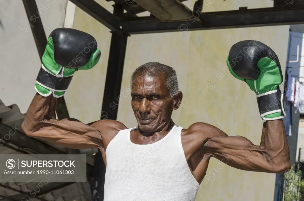 Mid sixties male boxer at Rafael Trejo Boxing Gym, Habana Vieja, Havana, Cuba
