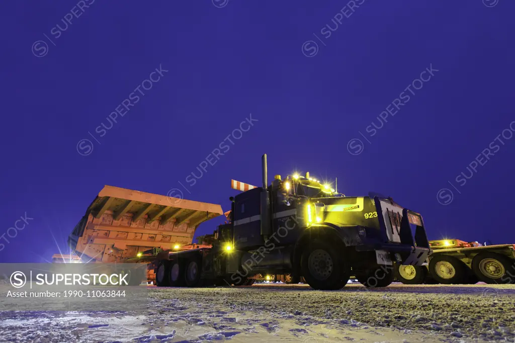 Trucks parked ready for work Northwest Territories, Canada.
