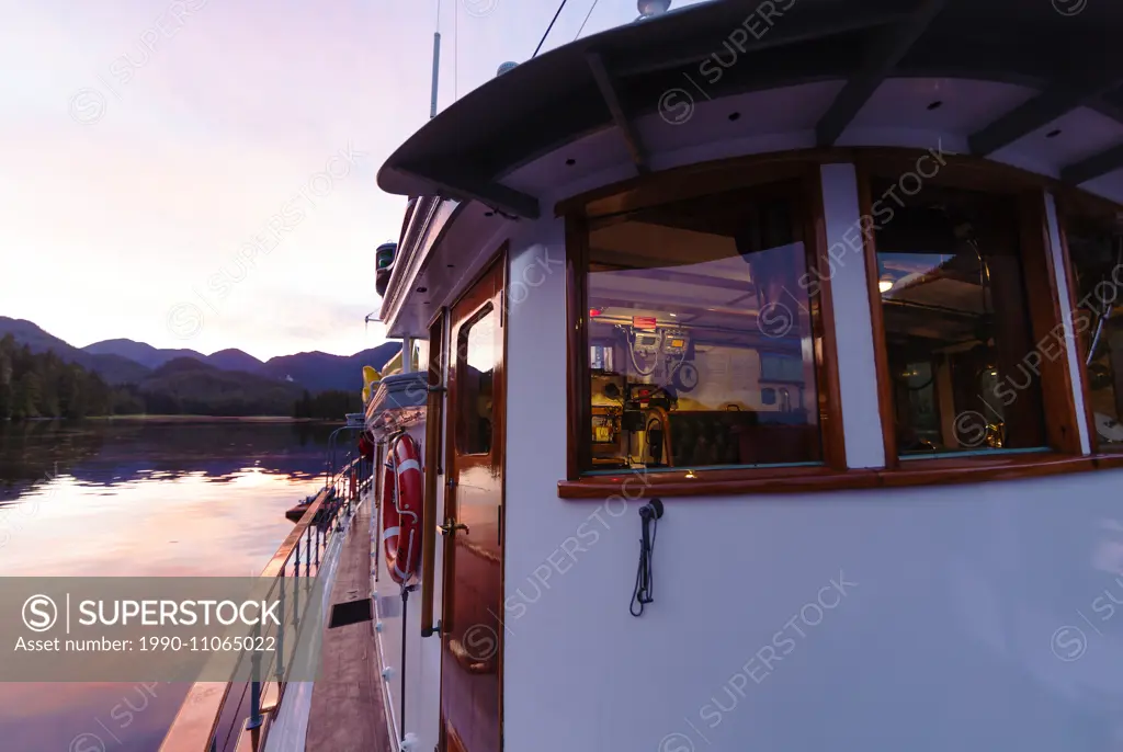 Columbia III at anchor for the evening while cruising through Mussel Inlet in the Great Bear Rainforest. Fjordland, Northern British Columbia Coast, B...