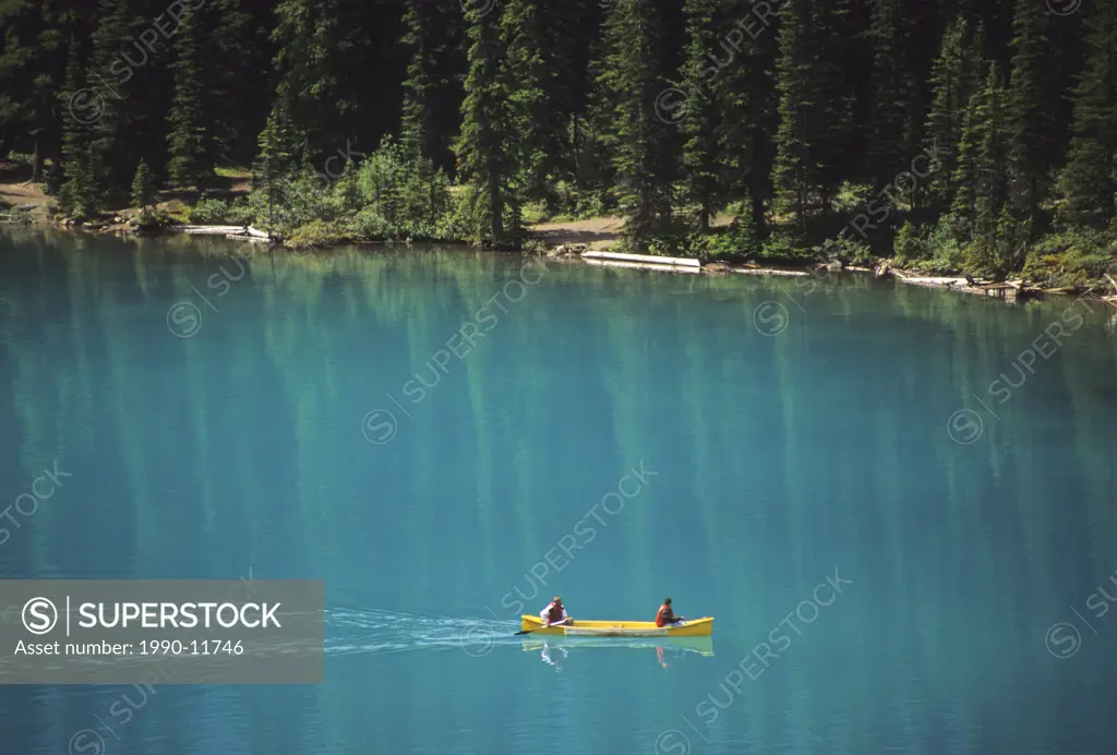 Canoers on Moraine Lake, Banff National Park, Alberta, Canada