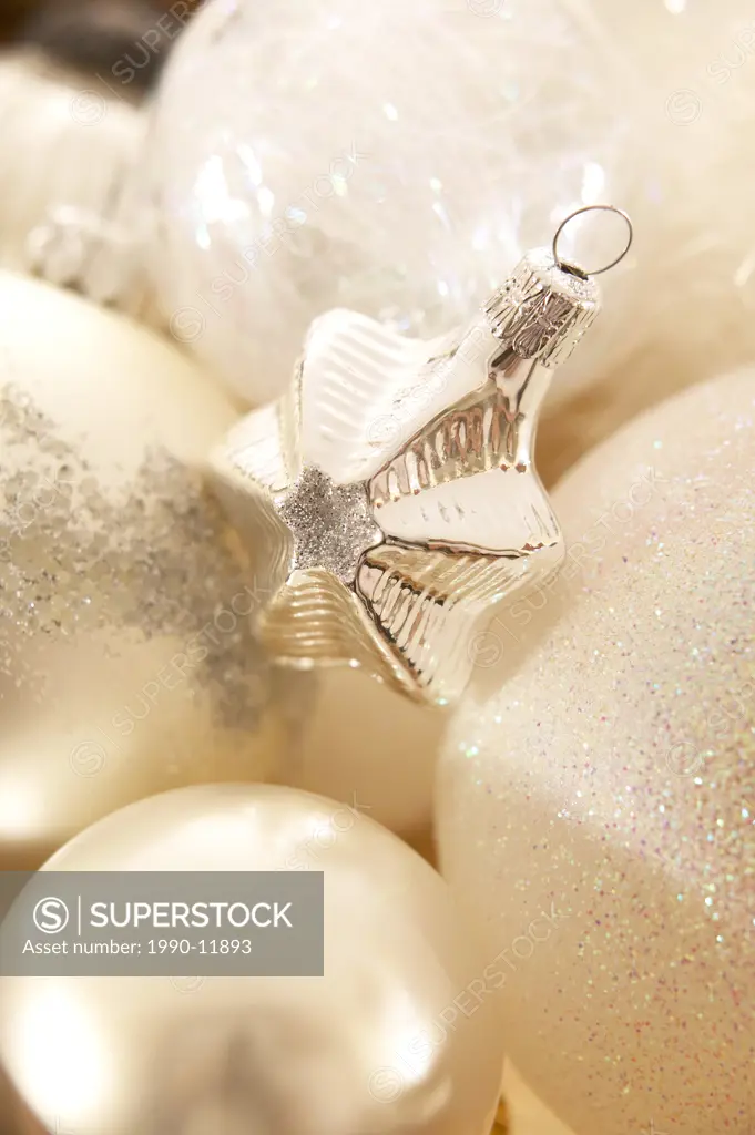 white christmas ornaments gathered in a silver bowl, Montreal, Quebec, Canada