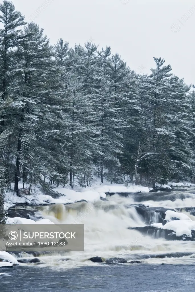 Winter at Wilson´s Falls on the Muskoka River along the Trans_Canada Trail in the Muskoka region near Bracebridge, Ontario, Canada.
