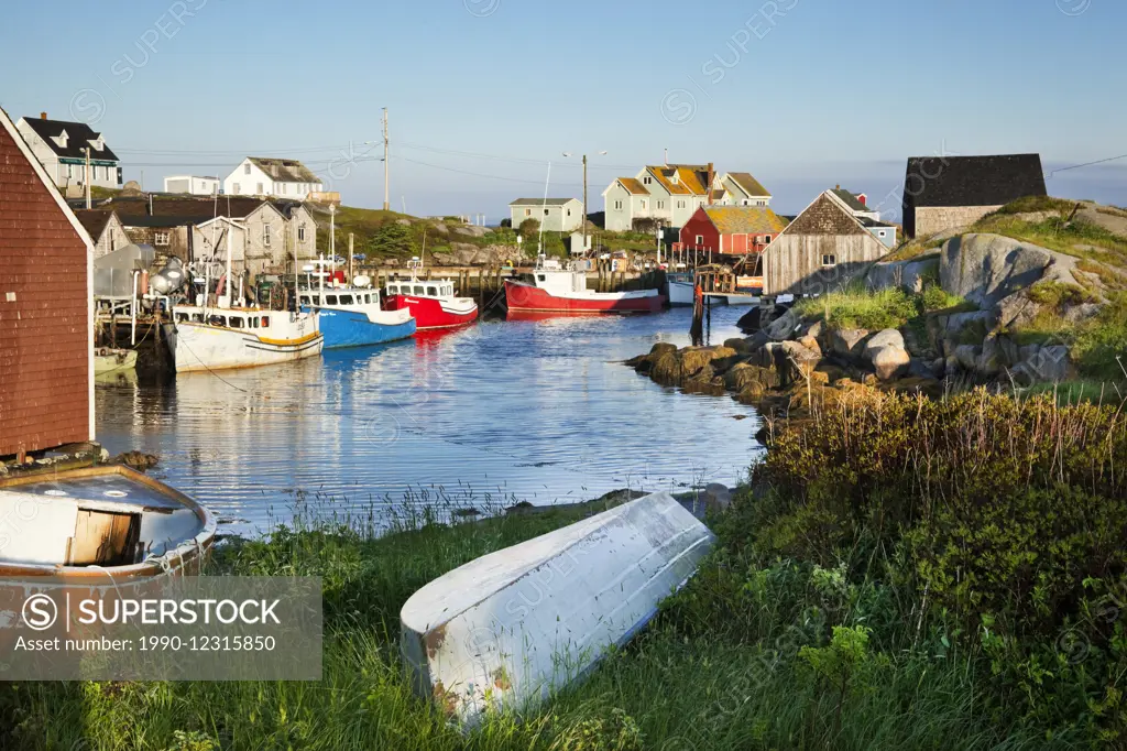 Fishing boats tied up alongside the wharf at Peggy's Cove, Nova Scotia