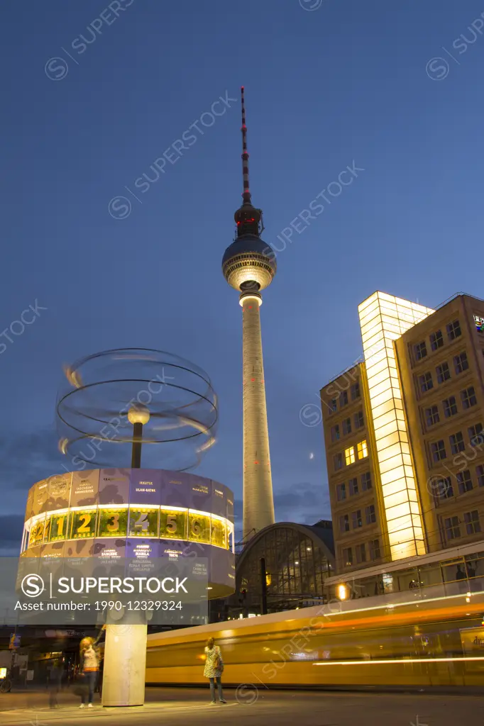 The Weltzeituhr, Worldtime Clock and the Fernsehturm or Berlin TV Tower at Alexanderplatz in Berlin, Germany