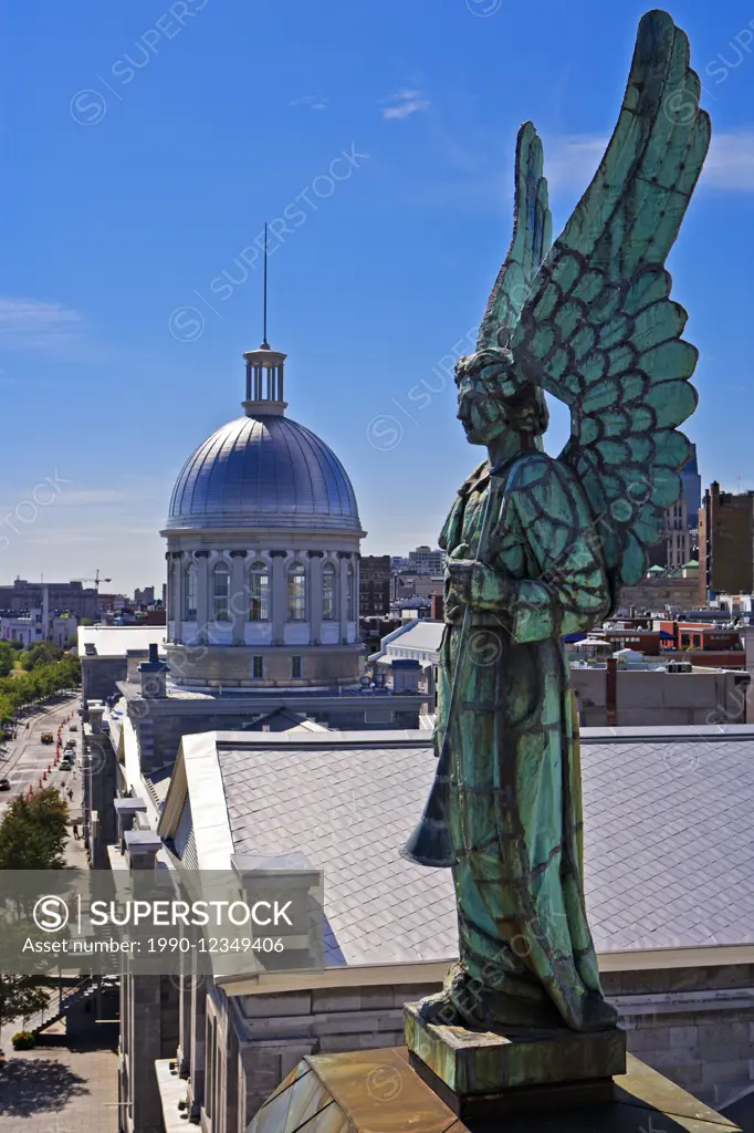 Angel atop the Notre-Dame-de-Bon-Secours Chapel and the dome of the Bonsecours Market, Marche Bonsecours in Old Montreal, Canada
