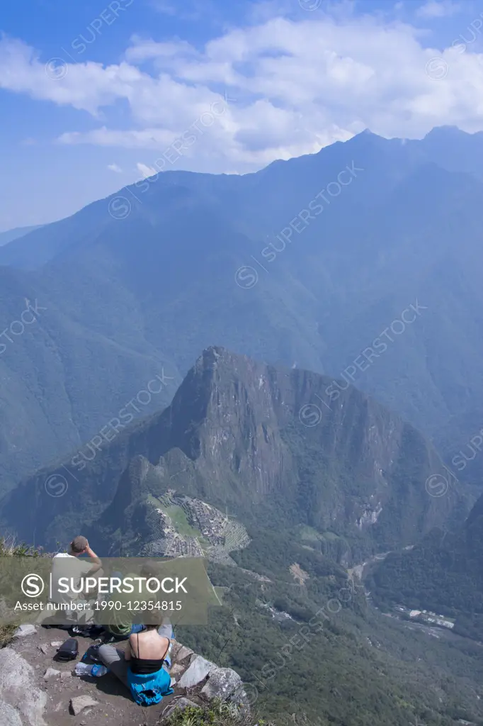 Travellers at the high vantage point of Montana Machu Picchu, Peru