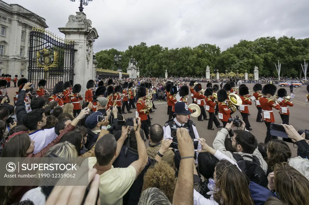 Changing Guard Ceremony takes place in Windsor Castle on August 16 2014, Windsor, England. British Guards in red uniforms are among the most famous in...