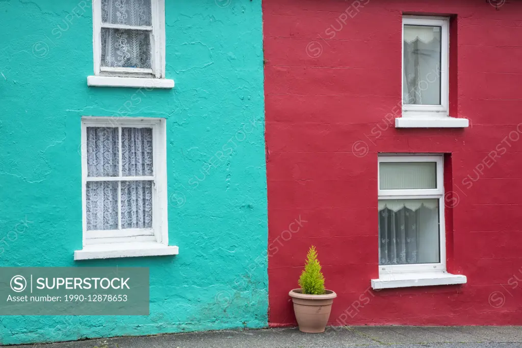 Brightly painted attached homes, Ardgroom, County Cork, Ireland