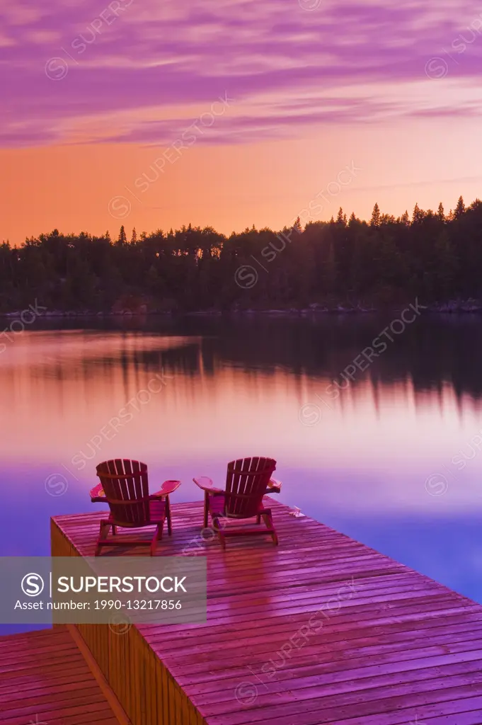 Muskoka chairs on dock, Lake of the Woods, Northwestern Ontario, Canada