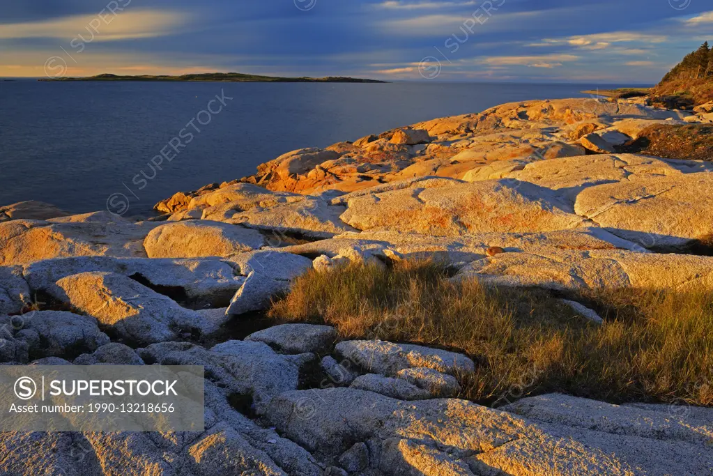 Sunset on rocky shoreline of Chedabucto Bay (Atlantic Island) Fox Island Nova Scotia Canada