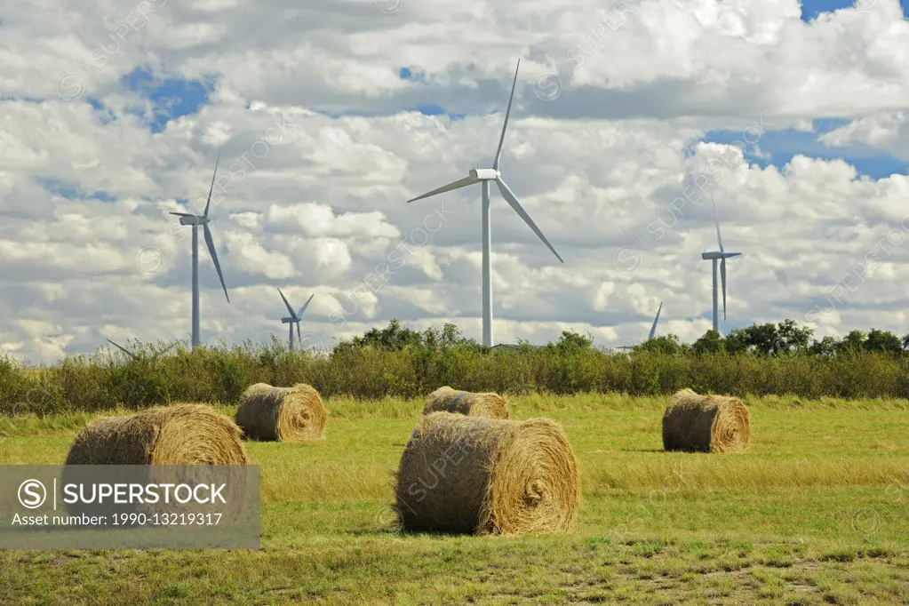 Wind turbines and bales Rosenhof Saskatchewan Canada