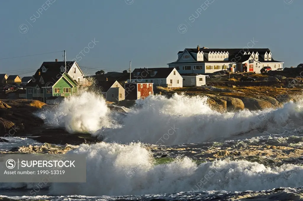 North Atlantic Ocean storm waves crash into granite coastline at fishing village of Peggy´s Cove, Nova Scotia, Canada.