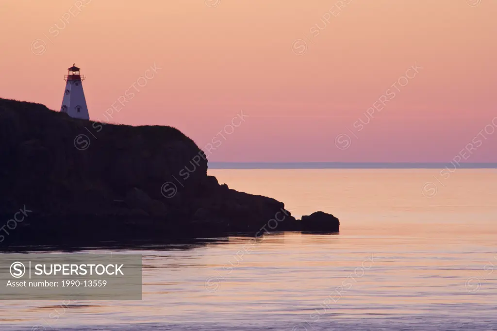 Sunset over Boar´s Head Ligthhouse on Long Island, seen from across Petite Passage between Digby Neck and Long Island, Bay of Fundy, Digby Neck and Is...