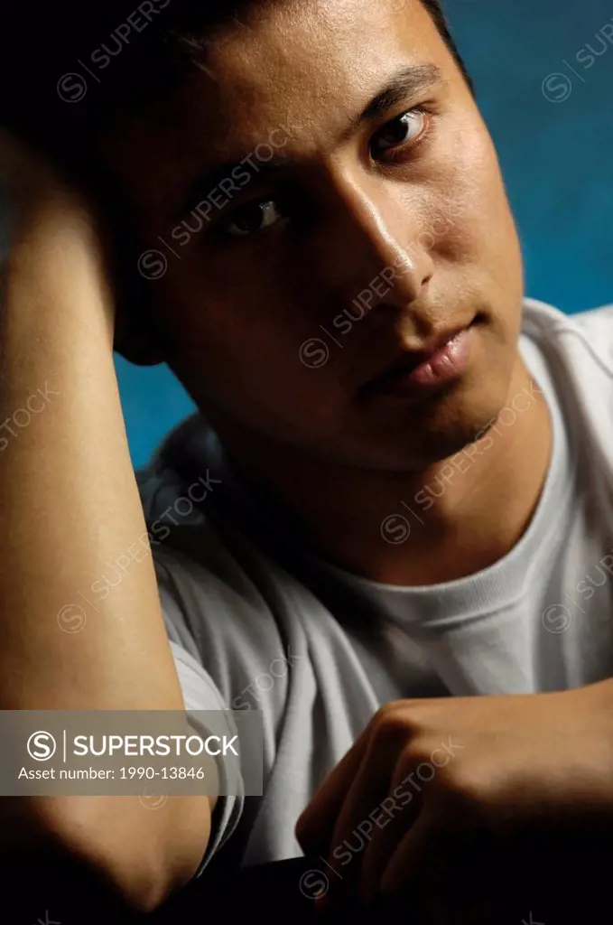 Young asian man around 20_25 years old Half Korean half European ethnicity Artistic expressive vertical low_key portrait