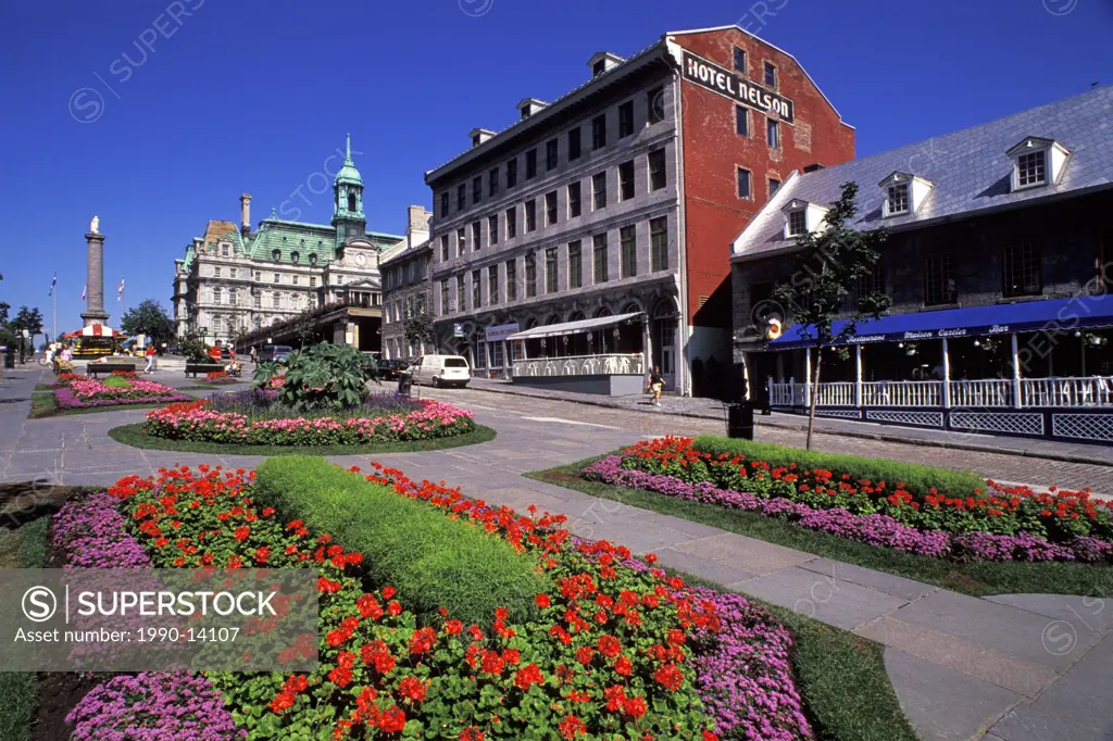 View from the square toward Nelson´s Column and the Montreal City Hall, Place Jacques_Cartier, Old Montreal, Montreal, Quebec, Canada. Place Jacques_C...