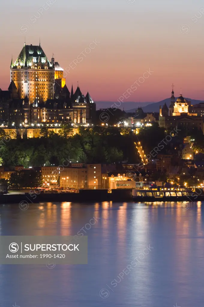 Chateau Frontenac Hotel from across St  Lawrence River at evening twilight, Quebec, Canada