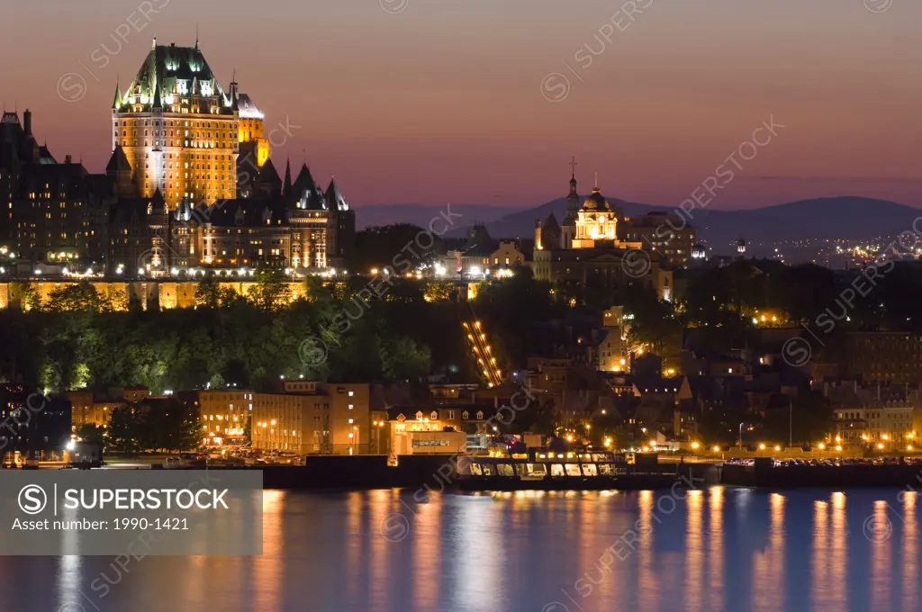 Chateau Frontenac Hotel from across St  Lawrence River at evening twilight, Quebec, Canada