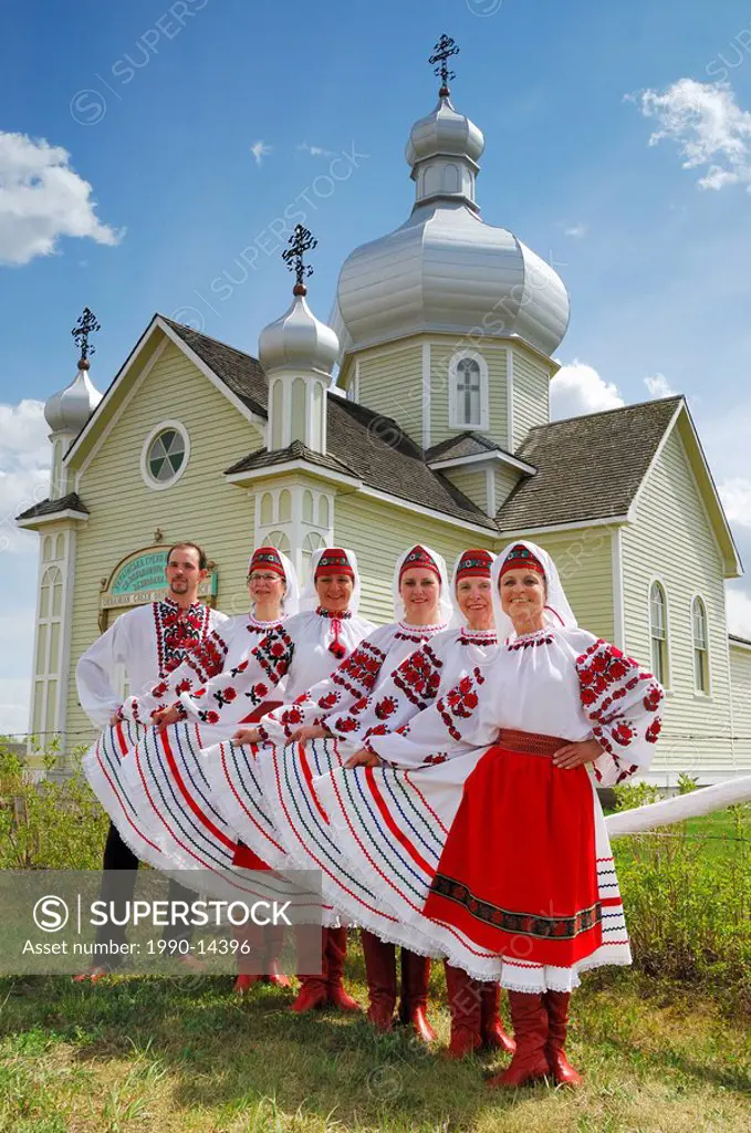 Ukrainian dancers pose in front of St.Vladimir´s Ukrainian Greek Orthodox Church in the Ukrainian Cultural Heritage Village, east of Edmonton, Alberta...