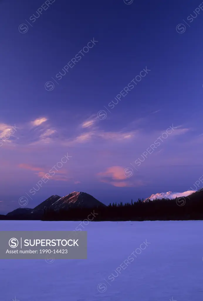 Frozen McDonald Lake at sunset, near Atlin, British Columbia, Canada