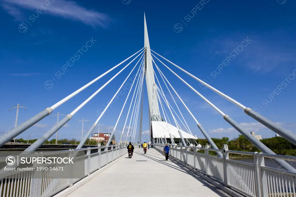 Pedestrian bridge crossing the Red River between city of Winnipeg and Saint Boniface in Manitoba, Canada