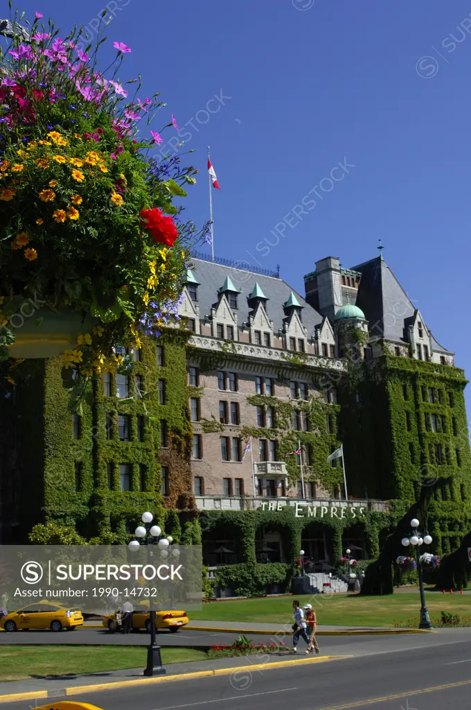 Government Street and Empress Hotel with flower planter in foreground, Victoria, Vancouver Island, British Columbia, Canada