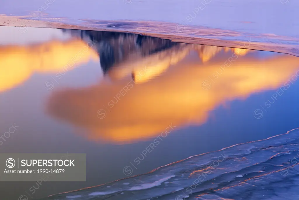 Peak of Mount Rundle reflected in Vermilion Lakes at sunset, Banff National Park, Alberta, Canada